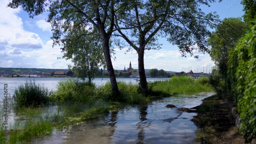 Flood at lake Konstanz Germany with city skyline and flooded shore Flood at lake Konstanz Germany with city skyline and flooded shore