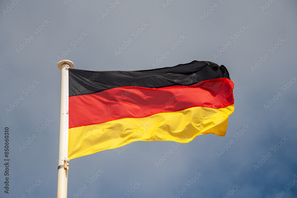 The federal flag of Germany. It consists of three horizontal stripes in black, red and gold or yellow. The federal flag of Germany. It consists of three horizontal stripes in black, red and gold or yellow.