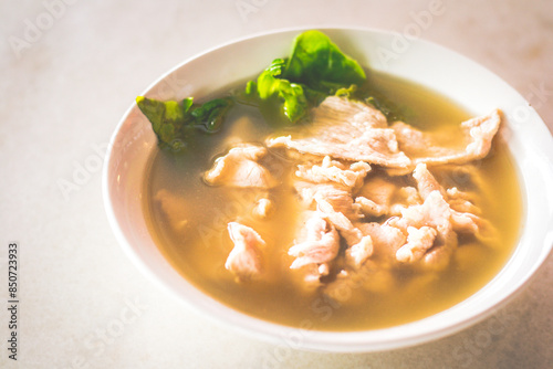 Slika na platnu sliced lean pork with lettuce in a peppery pork soup