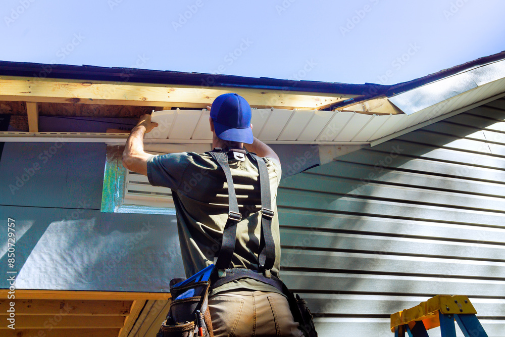 Poster Plastic soffits mounted to roof rafters on house with cathedral ...