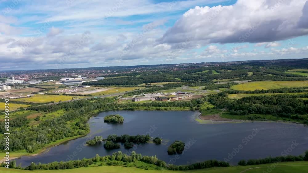 Aerial footage of construction work being done on the large service station while its being built in Leeds West Yorkshire, next to the Skelton Lake, the Skelton Lake Services near the M1 Motorway