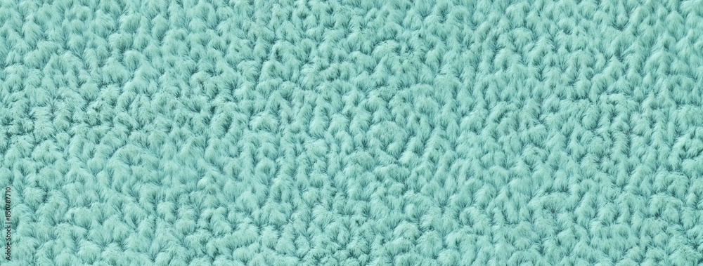 Texture of cyan fluffy woolen textile background from soft fleecy material, macro. Structure of turquoise fabric Texture of cyan fluffy woolen textile background from soft fleecy material, macro. Structure of turquoise fabric