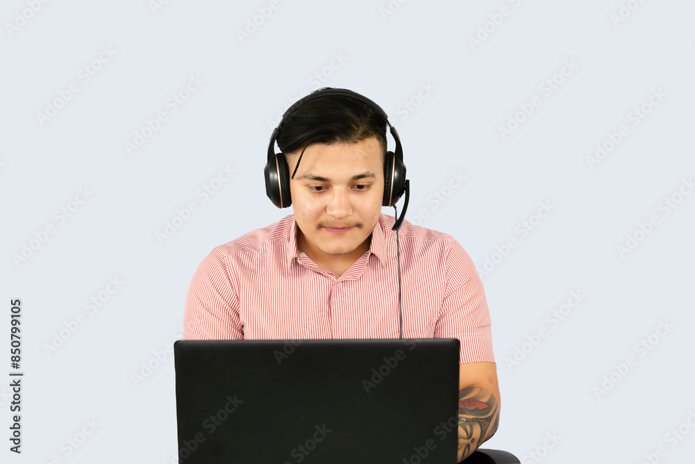 Front Desk Male Receptionist with Mobile Device Laptop and Notepad gives expressions and gestures of happy in Office Environment Front Desk Male Receptionist with Mobile Device Laptop and Notepad gives expressions and gestures of happy in Office Environment