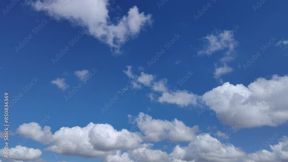 In the blue sky there are some clouds circulating In the blue sky there are some clouds circulating