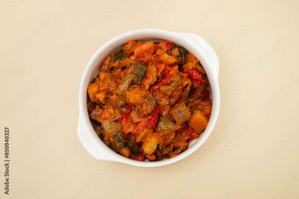 gourmet ratatouille in a white bowl.