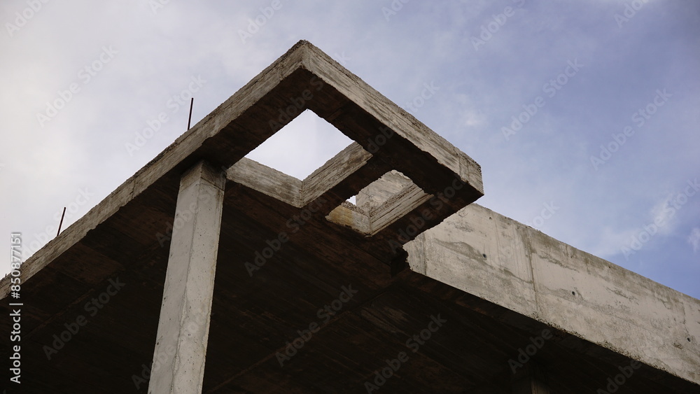 unfinished concrete structure against the sky unfinished concrete structure against the sky