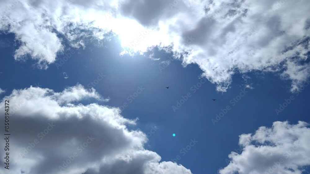 Clouds that are very close together move in the direction of the sun and cover it Clouds that are very close together move in the direction of the sun and cover it