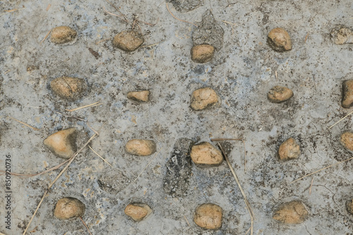 Wall round stone pebble rock texture background