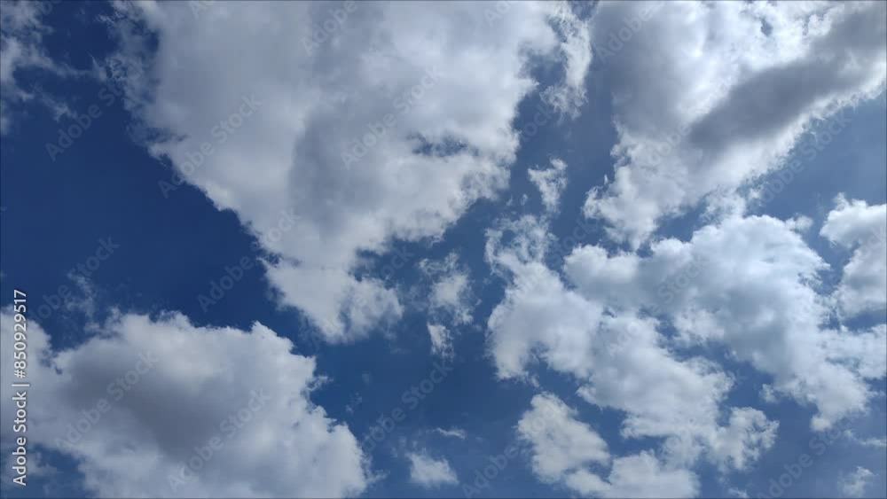 Landscape of the radiant sky at noon with altocumulus anda cumulus