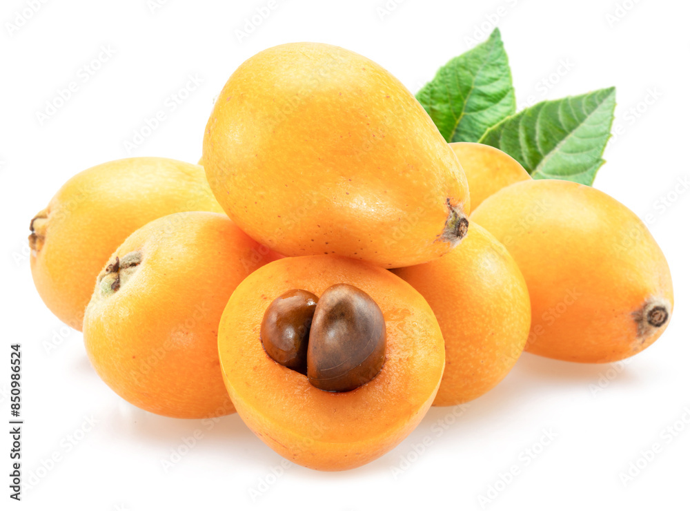 Ripe perfect loquat fruits with green leaves isolated on white background. Ripe perfect loquat fruits with green leaves isolated on white background.