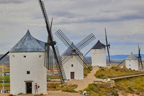 Old windmills in top of the hill in Consuegra Village photo