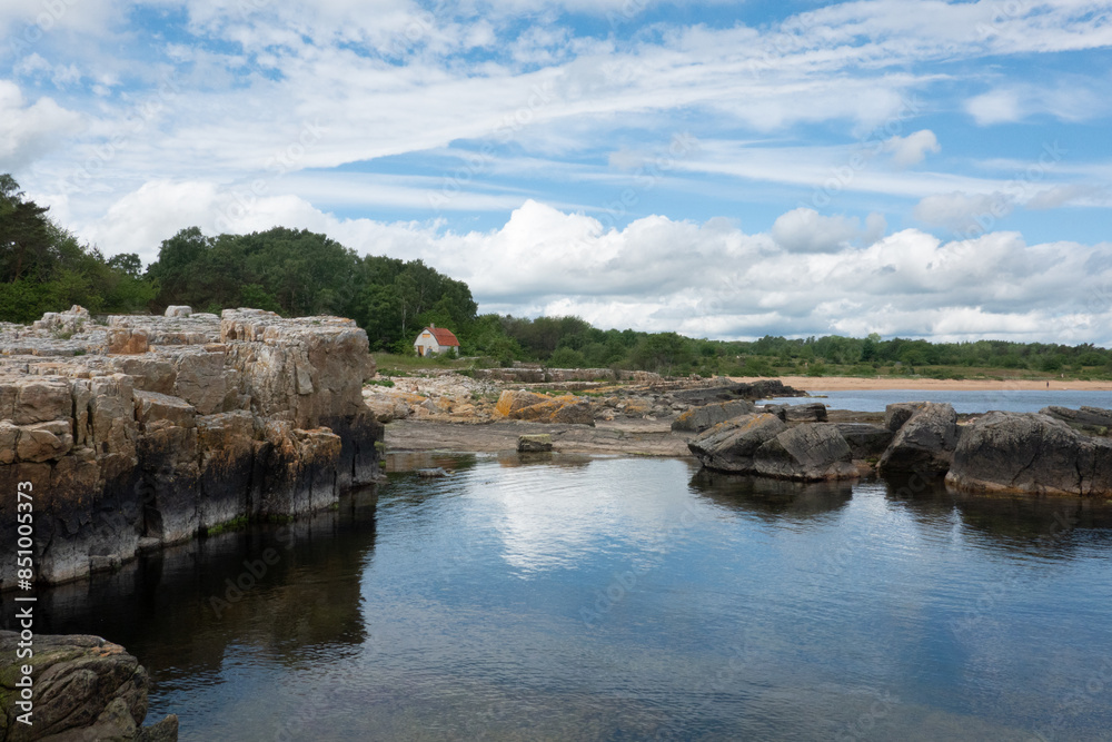 Small-scale fishing in Skane, Sweden. Carts with ropes, fishing nets and buoys near the sea. Small-scale fishing in Skane, Sweden. Carts with ropes, fishing nets and buoys near the sea.