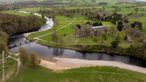 Aerialo Photo of River Wharfe Bolton Abbey The River Wharfe flows through Bolton Abbey, an estate in Wharfedale, North Yorkshire, England. It starts above the village of Buckden photo