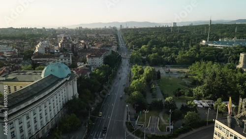 Aerial drone shot of the old town in Sofia, Bulgaria at sunrise. Eastern Europe. The city center buildings and boulevards as seen from above during sunrise.