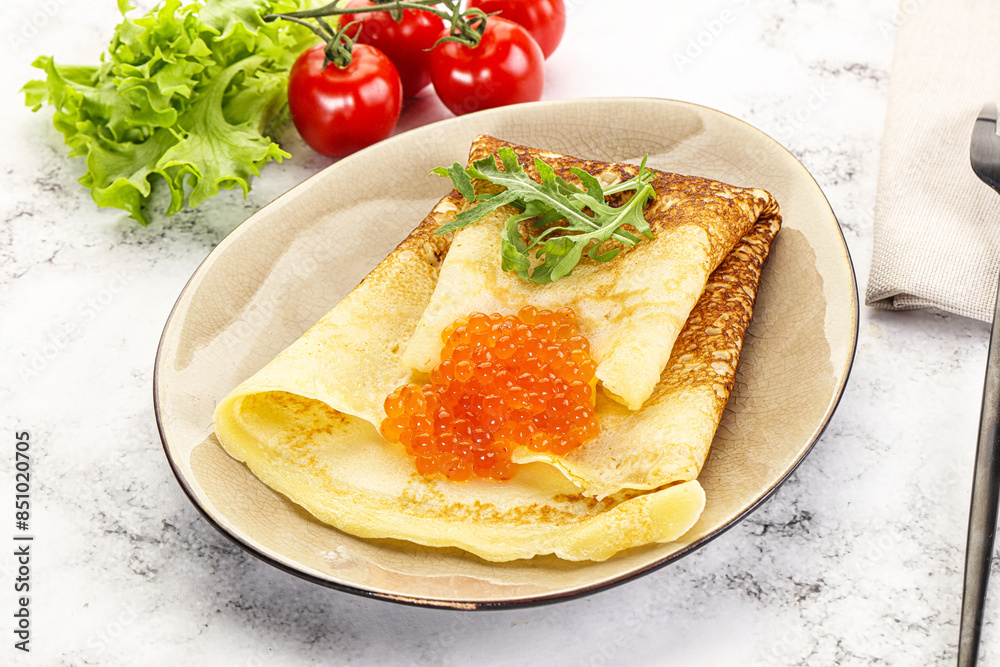 Russian pancake with red caviar