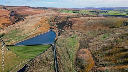 Cinematic, aerial clip of Ogden Reservoir, Oldham, on the edge of the Pennines. photo