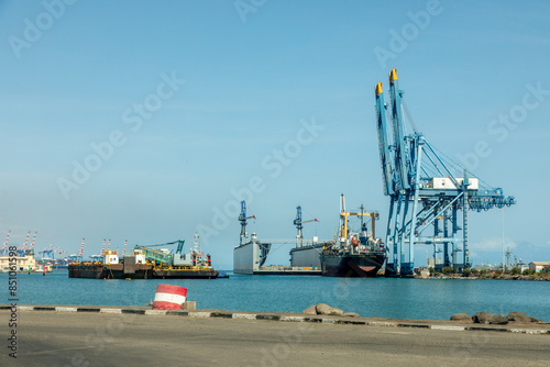 Djibouti city port cargo terminal with cranes, floating docks and ships, Djibouti
