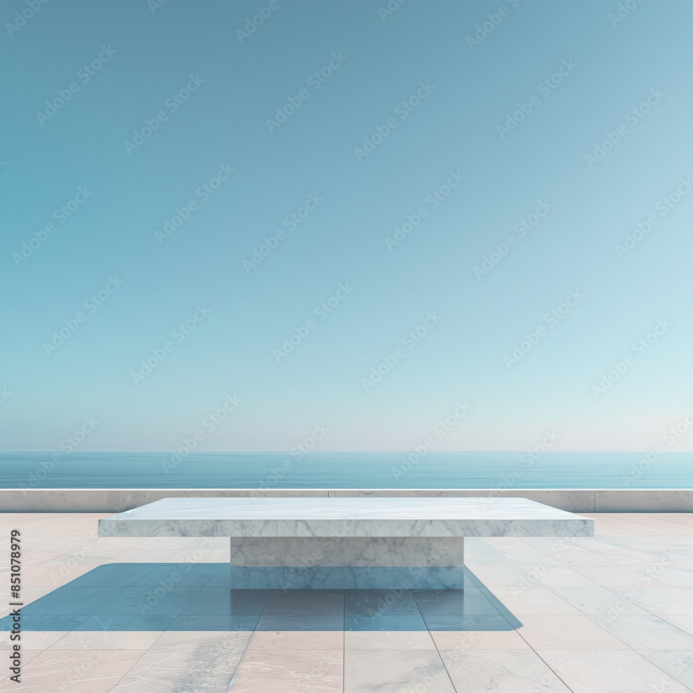 There is an empty square marble table in the centre of the picture with a simple, clean background and a light blue sky in the background There is an empty square marble table in the centre of the picture with a simple, clean background and a light blue sky in the background