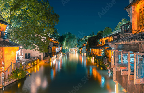 A Beautiful Historical Chinese water town at night photo