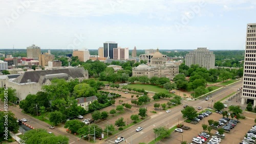 Aerial footage over Jackson, MS including Mississippi State Capitol Building