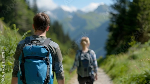 A couple hiking on a holiday, surrounded by tall pine trees and mountains. Hiking couple explores mountain paths on a holiday, capturing outdoor beauty.