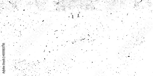 Subtle grain vector texture overlay. Abstract black and white gritty grunge background. Abstract vector noise. Small particles of debris and dust. 