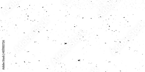 Subtle grain vector texture overlay. Abstract black and white gritty grunge background. Abstract vector noise. Small particles of debris and dust. 