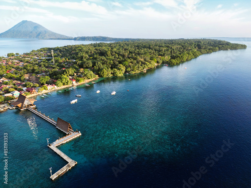 Indonesia Bunaken - Drone view Bunaken Island with coral reef and Manadotua Island