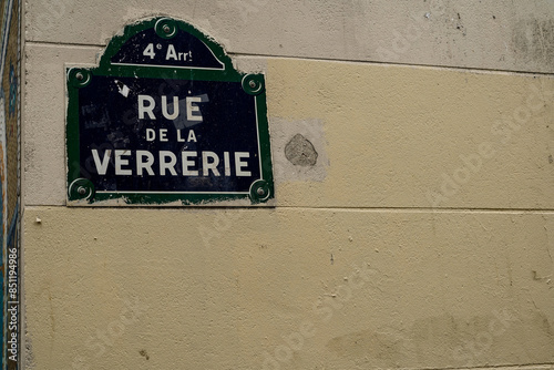 typical vintage street name sign from Paris , Rue De La Verrerie photo