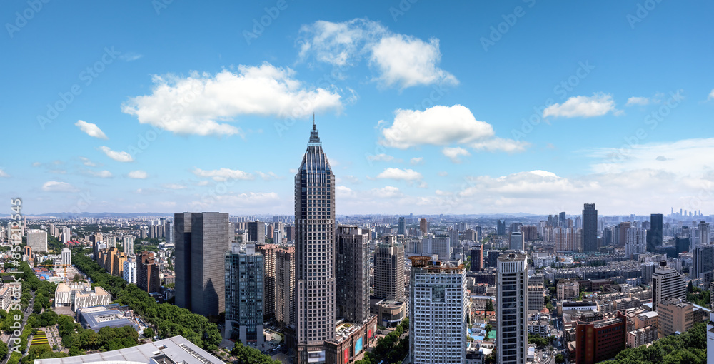 Fototapeta premium Majestic City Skyline Under Blue Skies