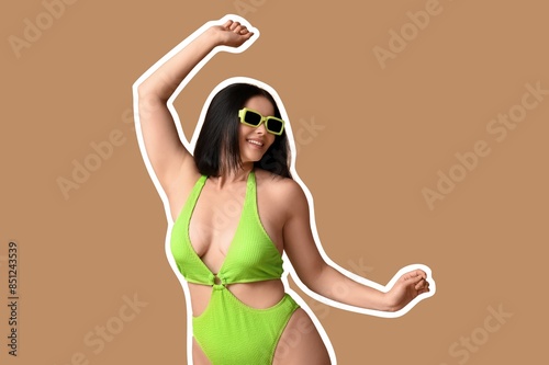 Dancing young woman in swim...