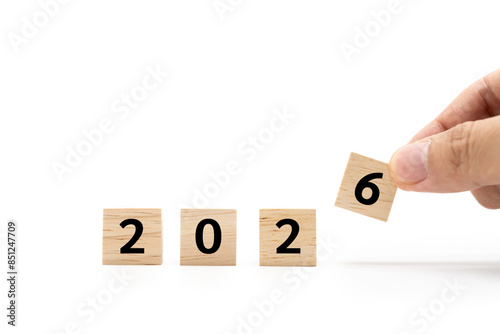 wooden cube blocks with 2026 text isolated on white background. numbers on wooden blocks with copy space. 2026 new year idea concept.