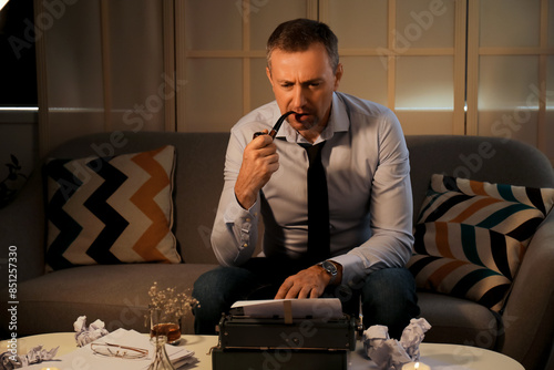 Mature man with glass of wh...