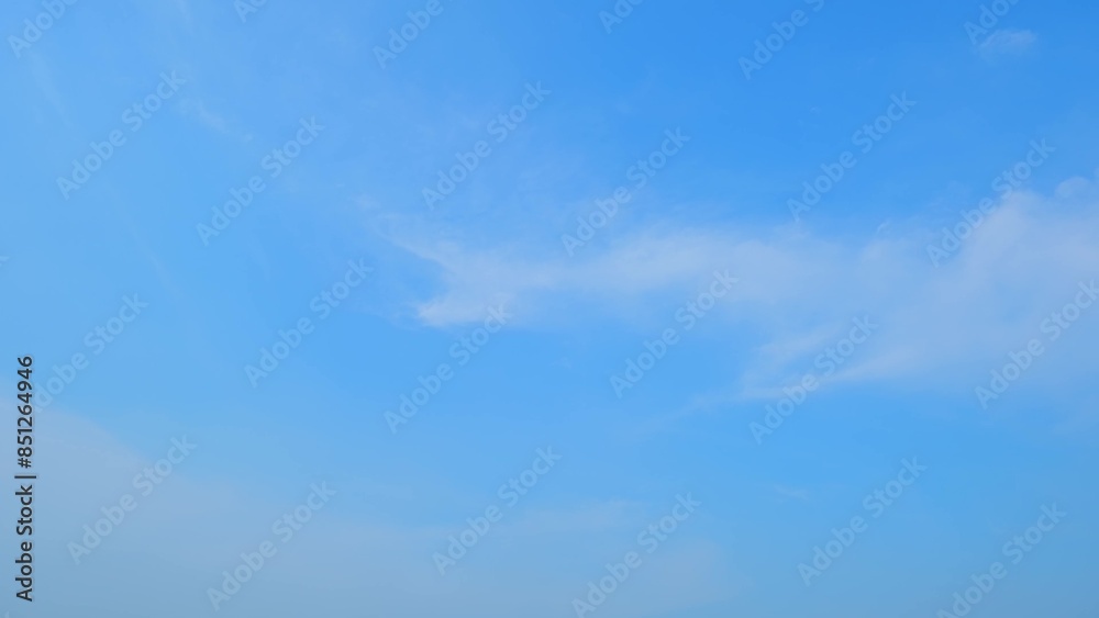 A clear blue sky with a few wispy white clouds scattered lightly across it. The bright, vibrant blue hue creates a sense of calm and tranquility. Wonder of nature background.
A clear blue sky with a few wispy white clouds scattered lightly across it. The bright, vibrant blue hue creates a sense of calm and tranquility. Wonder of nature background.