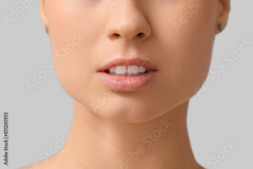 Young woman on white backgr...