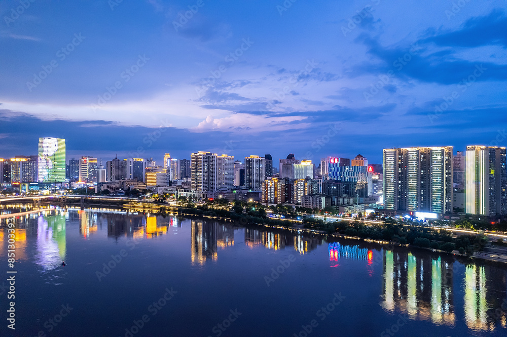Fototapeta premium Aerial photography of the night scene on the east bank of the Xiangjiang River in Zhuzhou, China