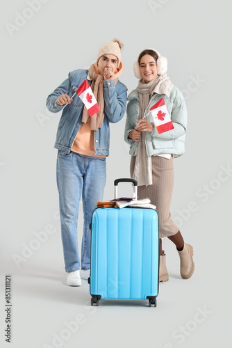 Young couple of tourists in...