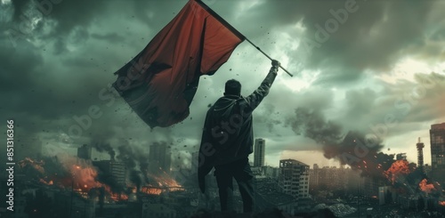 Man waves red revolution flag amid war torn cityscape. Smoke and fire rise from ruins of destroyed buildings. Rebellion and struggle concept. Conflict zone. Resistance symbol. Fire and smoke. photo