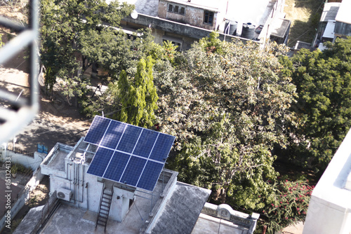 solar panel installed on the roof or terrace of the house in India.