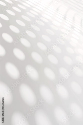 Modern white background with a clean and minimalist design featuring a subtle polka dot pattern, creating an elegant and contemporary aesthetic for various uses photo