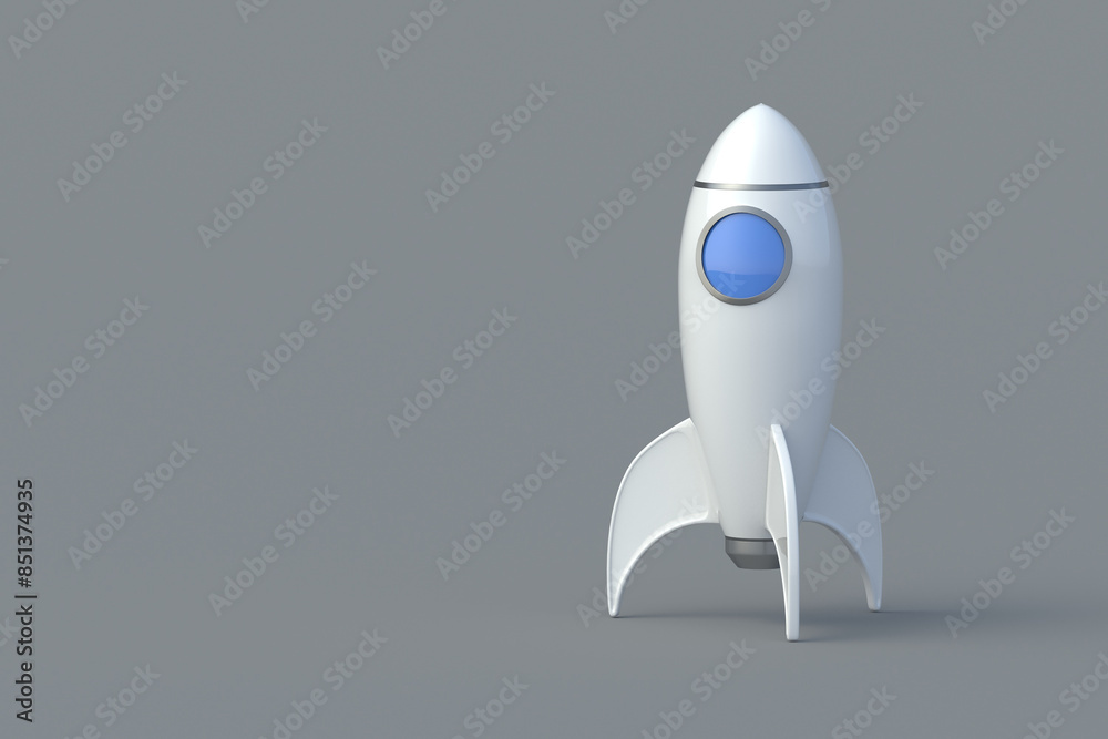 Start new business. Startup concept. Children's games. Galaxy exploration. Tourist travel into space. Modern technologies. Work speed. One toy rocket on gray background. Copy space. 3d render Start new business. Startup concept. Children's games. Galaxy exploration. Tourist travel into space. Modern technologies. Work speed. One toy rocket on gray background. Copy space. 3d render