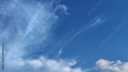 Beautiful and curious landscape of the sky with very thin cirrus clouds and other clouds in the afternoon