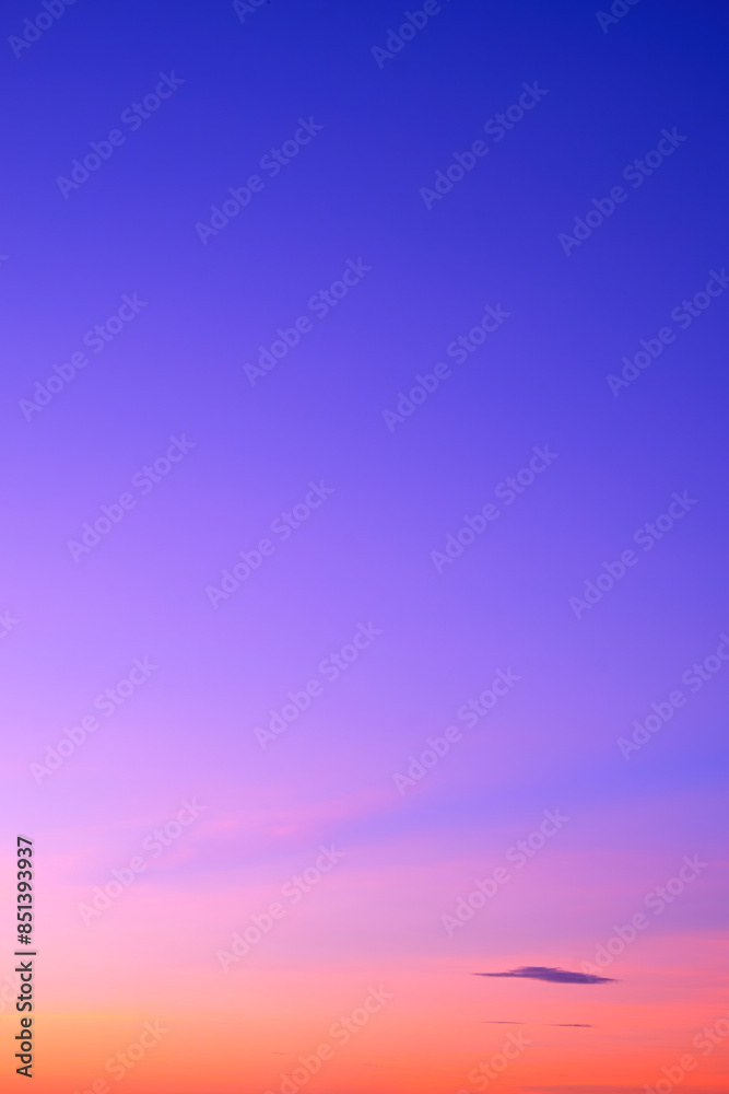 Sunrise sky background in early morning with majestic colorful gradient orange sunlight on idyllic tranquility blue sky in minimal style and vertical frame Sunrise sky background in early morning with majestic colorful gradient orange sunlight on idyllic tranquility blue sky in minimal style and vertical frame