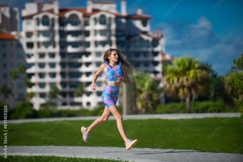 Woman Run on South beach, Miami, Florida. Fit woman doing workout on Miami beach. Summer Fitness sport model. American Lifestyle active people. Fit girl run on Miami south beach. Woman Run on South beach, Miami, Florida. Fit woman doing workout on Miami beach. Summer Fitness sport model. American Lifestyle active people. Fit girl run on Miami south beach.
