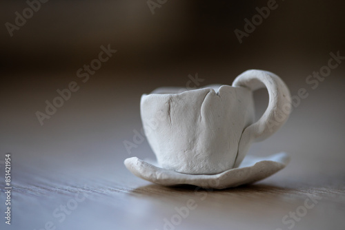 Coffee cup made of clay photo