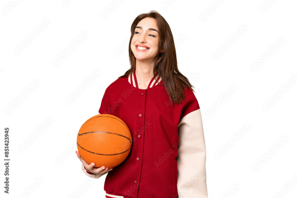 Young basketball player woman over isolated chroma key background thinking an idea while looking up Young basketball player woman over isolated chroma key background thinking an idea while looking up