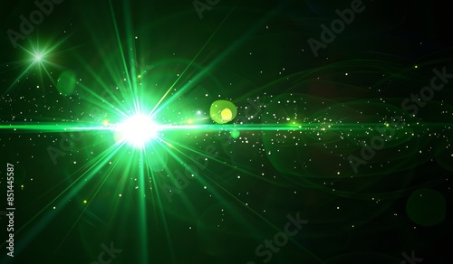 A glowing green light with lens flare on black background