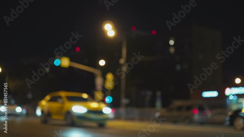 Wallpaper Mural Defocused night city traffic with moving car lights and urban street atmosphere, abstract background for transportation, business, technology and modern city concepts Torontodigital.ca