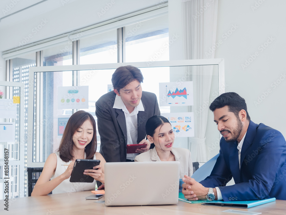 Portrait business team woman and man asian group meeting sit look holding document and look computer talk newproject creative write note plan ready for happy working online sale in room office company Portrait business team woman and man asian group meeting sit look holding document and look computer talk newproject creative write note plan ready for happy working online sale in room office company
