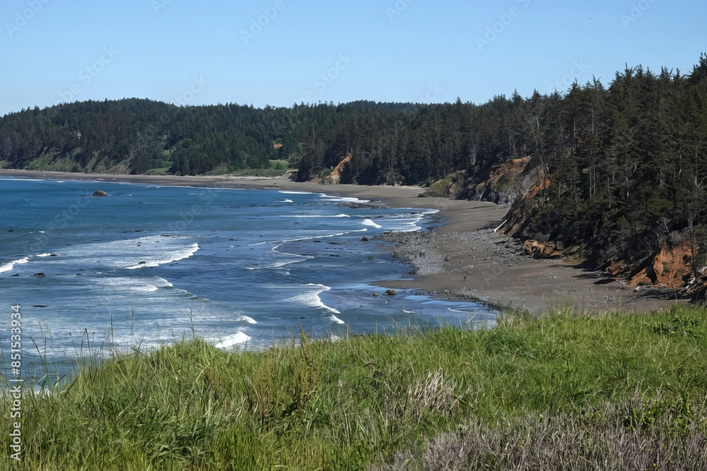 Scenic high angle landscape viewpoint on the North California beach at Crescent City, California against a blue sky Scenic high angle landscape viewpoint on the North California beach at Crescent City, California against a blue sky